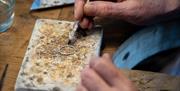 A close up of a ring being made as part of the jewellery making workshop with Gobbins Crafts in Islandmagee