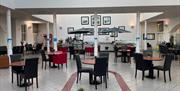 Seating area within The Glasshouse Bistro in Carrickfergus Civic Centre