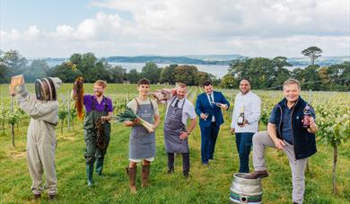 a group of people representing the businesses taking part in thethe Taste Eats Devon Festival 2025