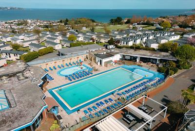 Overhead pool view of Beverley Holidays, Paignton, with sea in background