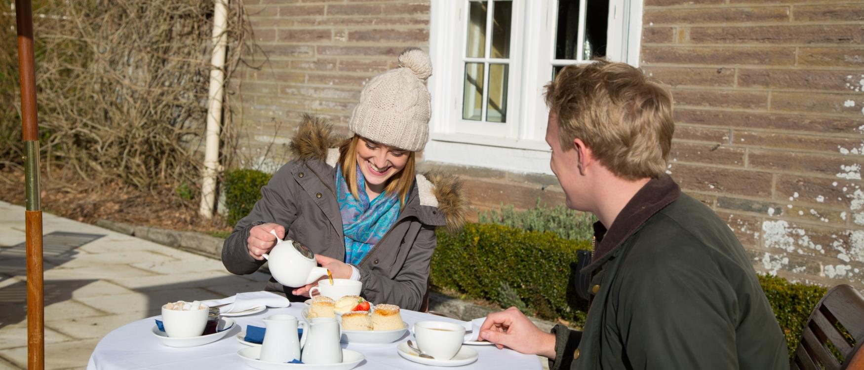 People eating Cream Tea
