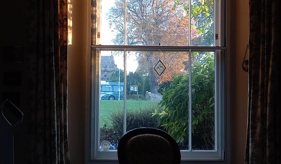 Village Green through window