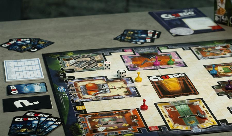 Cluedo board game set up on a table