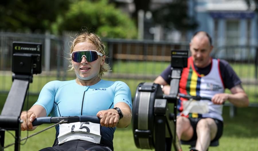 Athletes taking part in the rowing element of the triathlon