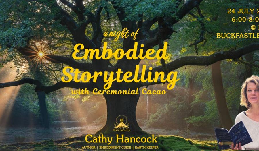 Author NaturaCathy reading book, storytelling, under big Mama Earth Tree