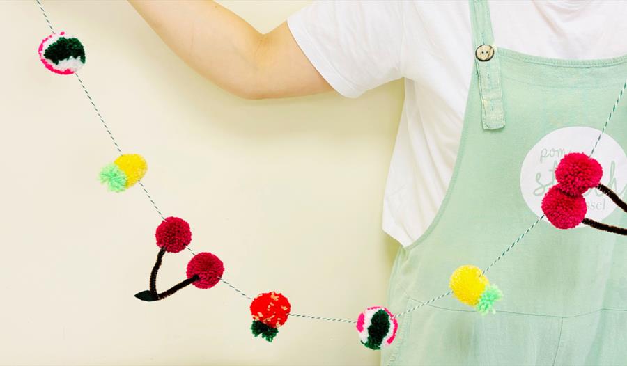 Make a georgeous summer fruit pom-pom garland at House of Marbles this Summer