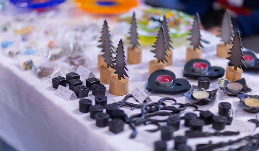 Photograph from previous Festive Market, showing various festive products for sale on a stall