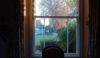 Village Green through window