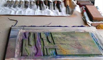 Printmaking screen and rollers