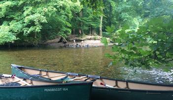 Evening canoe paddle, BBQ, and fireside story-telling