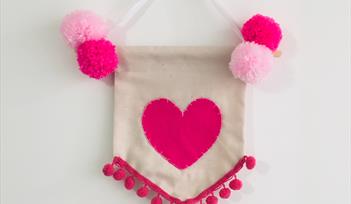 Create a Pom Pom Heart Wallhanging