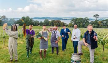 a group of people representing the businesses taking part in thethe Taste Eats Devon Festival 2025