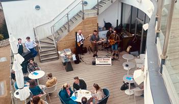 BBQ and Music on the Terrace.