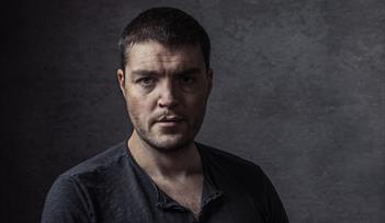 Tom Burke as The Marquis of Posa in Don Carlos