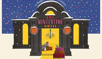 A graphic image for The Wintertime Hotel. The front of an old fashioned hotel., with twinkling lights, snow, a dressed up squirrel and stacks of old s