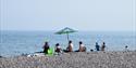 Family on Sidmouth beach