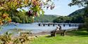 Couple looking at River Dart in Dittisham