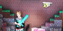 A Child stood infront of a Minecraft LEGO banner