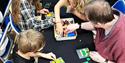 a Family taking part in a free LEGO activity