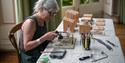 woman at a workbench making jewellery - Deon Open Studios