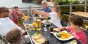 Family dining al-fresco