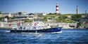 The Waterlink Ferry passing Plymouth Hoe