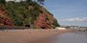 Angled view of Coryton Cove Beach seafront