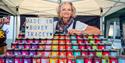 Clare from Clare's Preserves smiles at the camera from her stand at Nourish Festival, Bovey Tracey