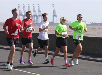 Participants running on course
