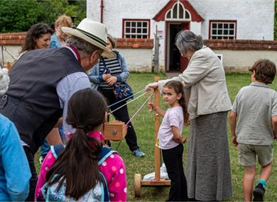 rope making demonstration with children having a go