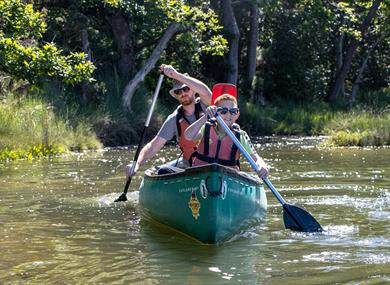 A Father and son in a canoe