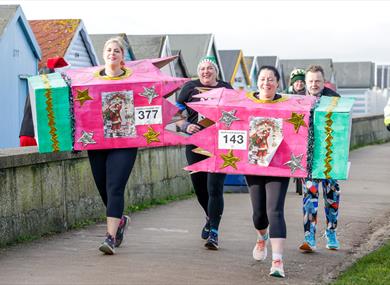 Participants running on course