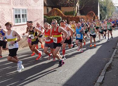 Participants running on course