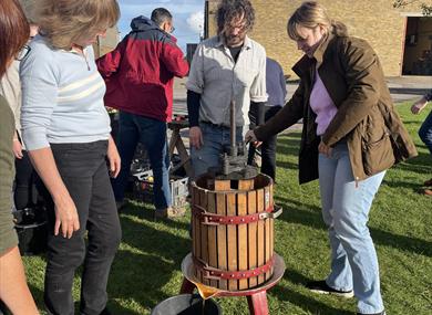 Group making Cider at Brogdale Farm in Kent