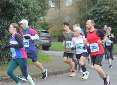 Participants running on course