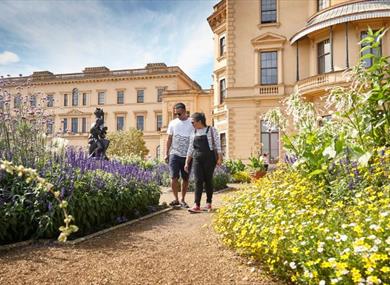 Couple walking around the garden outside Osborne House, garden tour, event, what's on, Isle of Wight