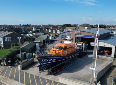Selsey Lifeboat Station taken from an elevated height from a drone showing the all weather lifeboat on the apron