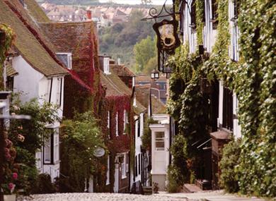 Mermaid Street in Rye town showing cobbles, pubs and timber-framed houses