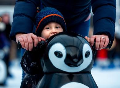 Child with a penguin-shaped skate aid at Ice Skate Portsmouth - credit Ice Skate Portsmouth and Vernon Nash