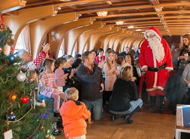 Father Christmas and families on board The New Orleans