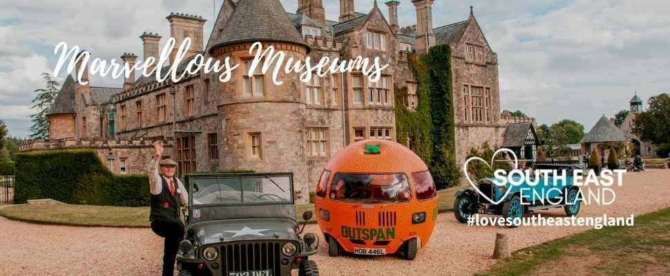 Historic cars outside Palace House at National Motor Museum, Beaulieu.