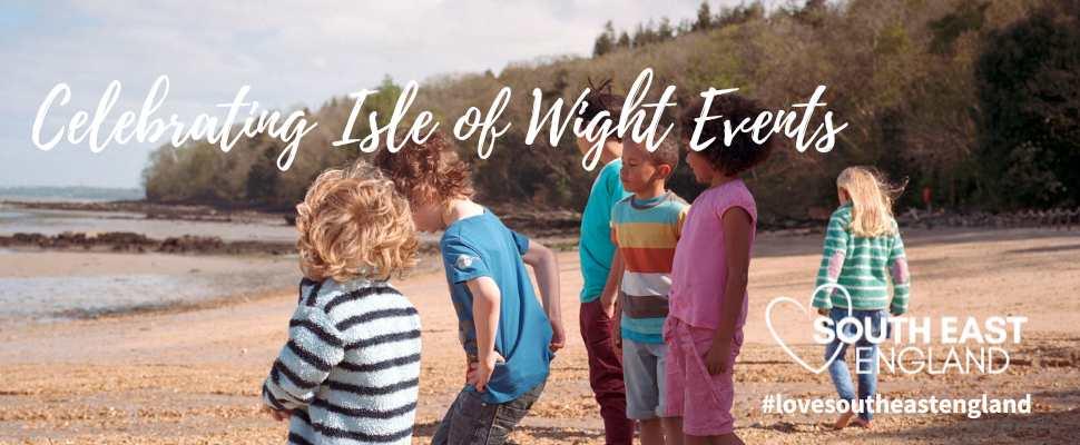 Group of children having fun on the private beach at Osborne House, Isle of Wight