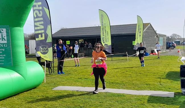 Participant running on course