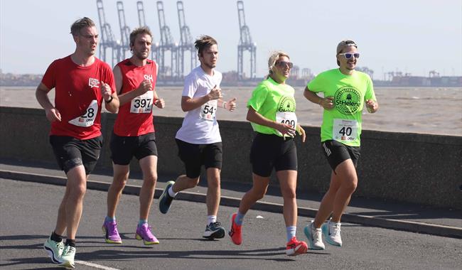 Participants running on course