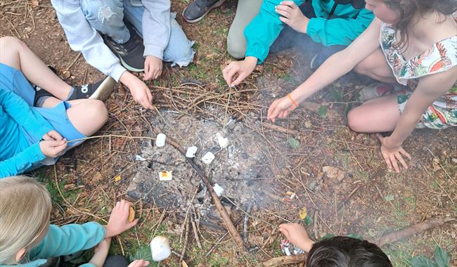 Group of Children toasting marshmallows at Painshill