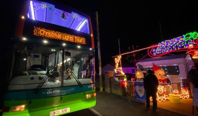 Southern Vectis bus in front of Christmas lights, Isle of Wight, event, what's on