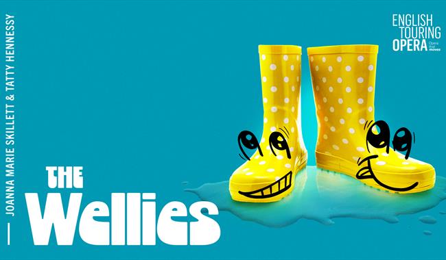 Yellow smiling wellies against a blue background