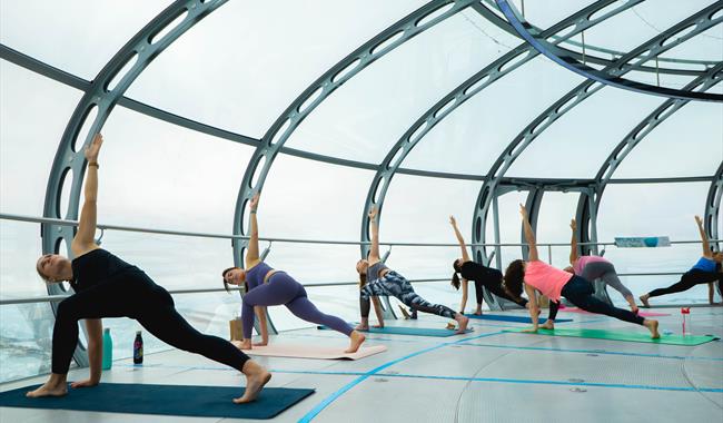 Yoga class on the Brighton i360 pod