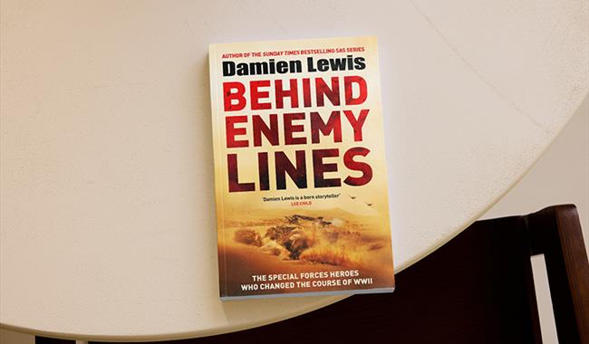 A copy of Damien Lewis' book on a table