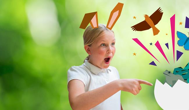 There is a girl wearing a white t-shirt and she has animated bunny ears on her head. She is pointing at an animated egg that has a snake, frog, butter